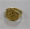 A yellow metal signet ring with shield-carved matrix 9.6g                                                                              