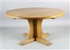 Robert Thompson "Mouseman". An adzed oak centre table, Diam.4ft 6in. H.2ft 4.5in.                                                      