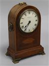 An Edwardian mahogany and inlaid mantel timepiece, height 11in.                                                                        