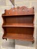 A Victorian oak wall shelf, width 60cm                                                                                                                                                                                      