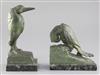 After Van de Voorde. A pair of patinated spelter bookends, modelled as a parrot and a heron, Tallest 8.5in,                            