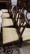 A set of five George III mahogany dining chairs and a similar carver                                                                   