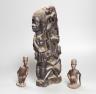 Four tribal hardwood carvings, two bows and two bronze spears longest 85cm                                                                                                                                                  