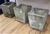 A set of three square shaped concrete gardens urns W.35cm approx.                                                                      