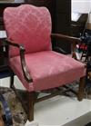 A 'Gainsborough' red armchair                                                                                                          