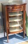 An Edwardian inlaid mahogany bow fronted music cabinet W.58cm                                                                          