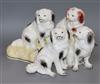 Four Samuel Alcock seated figures of King Charles spaniels, c.1840-50, H. 10.5cm - 12.5cm                                              