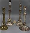 Four plated candlesticks, one fitted as a table lamp                                                                                   