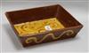 A 19ct century slipware baking dish, 25.8cm.                                                                                           