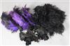A collection of black feathers and two feather boas                                                                                    