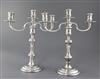 A pair of late 1970's silver two branch three light candelabra by William Comyns & Sons Ltd, height 34.8cm.                            