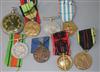 A quantity of French medals and a Service watch                                                                                        