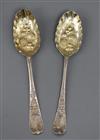 Two 18th century silver "berry" spoons including London, 1719, 3 oz.                                                                   