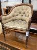 A late Victorian walnut caned seat back armchair                                                                                                                                                                            