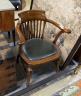 An early 20th century mahogany desk elbow chair                                                                                                                                                                             