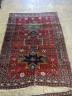 A Kazak red ground rug, 210 x 160cm                                                                                                                                                                                         