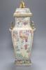 A large Chinese famille rose Canton decorated vase and cover, Daoguang period, height 53cm (a.f)                                                                                                                            