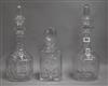 A pair of Victorian cut glass decanters and stoppers and another                                                                       