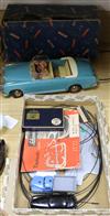 A Schuco Varianto racing game and a boxed Tippco TCO-112 Mercedes toy car                                                              