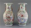 A pair of Chinese famille rose vases, 19th century, H. 45cm, one with section of rim lacking                                           