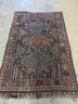 A Shiraz rug, 240 x 156cm                                                                                                                                                                                                   