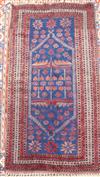 A Turkish blue and red rug, woven with a hexagonal medallion 184 x 185cm                                                               
