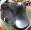 A black leather saddle                                                                                                                 