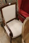 A French Empire mahogany scroll arm fauteuil                                                                                           