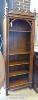 A Gothic revival oak open bookcase. W-76, D-39, H-215cm.                                                                                                                                                                    