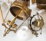 An Edwardian brass hanging oil lamp with opaque shade, overall drop 80cm Together with a large brass hall lantern                                                                                                           