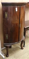 A George III mahogany bowfront corner cabinet on later cabriole legs W.78cm                                                            