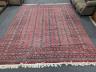 A Bokhara burgundy ground carpet, 360 x 276cm                                                                                                                                                                               
