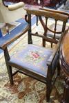 A set of five late George III mahogany dining chairs (one arm, for single), with floral tapestry seats                                 