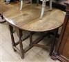 An oak gateleg table W.97cm                                                                                                            