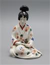 A Japanese Arita figure of a bijin, height 15.5cm                                                                                      