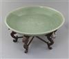 A Chinese Ming dynasty Longquan celadon dish, 15th century, d. 45cm, hongmu stand,                                                     