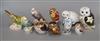 Seven Crown Derby owl paperweights and three budgies                                                                                   