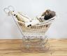 Two Armand Marseille 390 bisque dolls, largest 40cm., Lenci-type cloth doll, painted wicker pram and a child's rush seated elbow chair                                                                                      