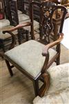 An early George III mahogany open armchair, with scrolled arm terminals                                                                