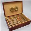 A humidor containing cigars                                                                                                            