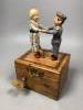 An early 20th century German musical dancing doll automaton, height 23cm                                                                                                                                                    