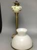 A Victorian brass and ceramic oil lamp, overall height including shade 78cm                                                                                                                                                 