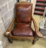 A leather upholstered hardwood plantation chair, width 91cm, depth 94cm, height 106cm                                                                                                                                       