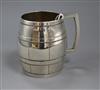 A sterling silver barrel shaped mug, maker C & K, 7.5 oz.                                                                              