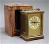 A carriage clock, case and key                                                                                                         