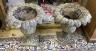 A pair of reconstituted stone campana garden urns on bases, diameter 42cm, height 46cm                                                                                                                                      