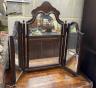 A Queen Anne revival walnut triple folding dressing table mirror, height 74cm                                                                                                                                               