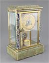 An early 20th century French champlevé enamel and onyx four glass clock, 11.5in.                                                       