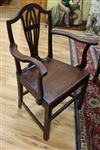 A set of seven George III provincial oak and elm dining chairs                                                                         