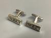 A modern pair of silver cufflinks by Harrods, length 23 mm, 15.7 g, with Harrods box.                                                                                                                                       